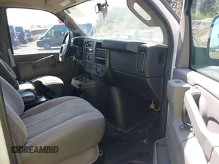 2016 Chevrolet Express Cargo Van with VIN 1GCWGAFF7G1151428, listed as a IAAI auction lot 41849380 with 124,553 mi miles. Bid and sale history available at carsss.com. Image 5.