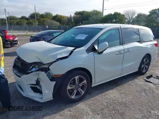 2019 Honda Odyssey Touring with VIN 5FNRL6H81KB068064, listed as a IAAI auction lot 41998072 with 83,280 mi miles. Bid and sale history available at carsss.com. Image 2.