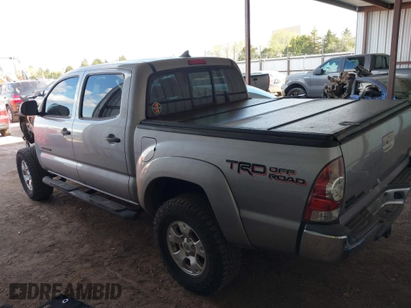 2014 Toyota Tacoma with VIN 3TMLU4EN3EM162738, listed as a IAAI auction lot 41871226 with 135,318 mi miles and . Bid and sale history available at DreamBid. Image 15.