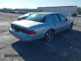 1997 Mercury Grand Marquis LS with VIN 2MELM75W7VX708034, listed as a IAAI auction lot 41878938 with 197,818 mi miles and . Bid and sale history available at DreamBid. Image 4.