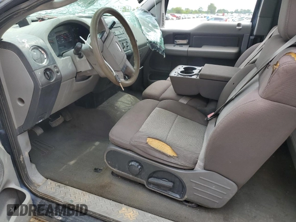 2005 Ford F-150 XLT with VIN 1FTPX145X5FA92244, listed as a Copart auction lot 61569865 with 184,219 mi miles and Salvage title. Bid and sale history available at DreamBid. Image 7.