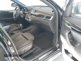 2018 BMW X1 xDrive28i z VIN WBXHT3C35J5L25056, wystawiony jako IAAI lot #42185474 z przebiegiem 62 631 mil mil oraz . Historia ofert i sprzedaży dostępna na DreamBid. Obrazek 5.