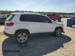 2012 Volkswagen Tiguan SEL with VIN WVGAV7AX9CW530331, listed as a Copart auction lot 50129405 with 141,387 mi miles and Salvage Title. Bid and sale history available at DreamBid. Image 3.