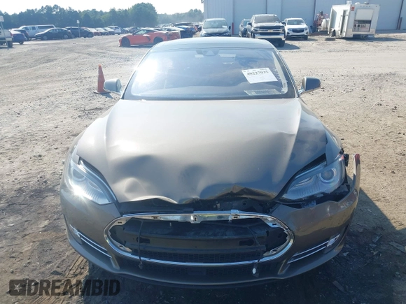 2016 Tesla Model S 70 with VIN 5YJSA1E1XGF126620, listed as a IAAI auction lot 40227035 with 71,400 mi miles and . Bid and sale history available at DreamBid. Image 12.