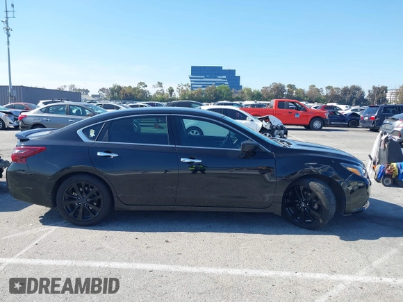 2017 Nissan Altima SL z VIN 1N4AL3AP2HC490191, wystawiony jako IAAI lot #42242495 z przebiegiem 195 261 mil mil oraz . Historia ofert i sprzedaży dostępna na DreamBid. Obrazek 13.
