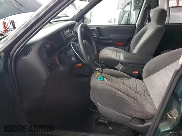1997 Jeep Grand Cherokee TSi with VIN 1J4FX58S6VC602782, listed as a Copart auction lot 86605074 with 158,971 mi miles and Salvage Title. Bid and sale history available at carsss.com. Image 7.