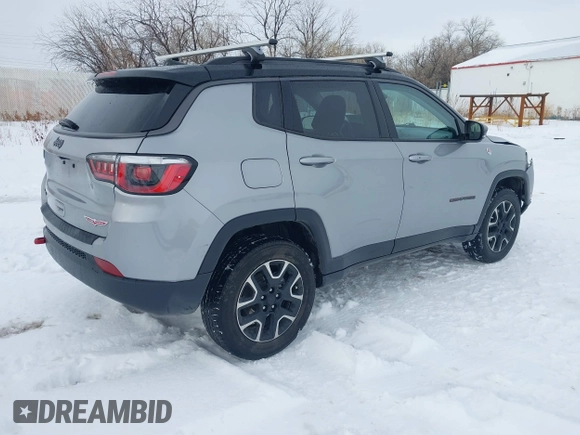 2020 Jeep Compass Trailhawk with VIN 3C4NJDDB1LT203329, listed as a IAAI auction lot 41301931 with 79,035 mi miles and . Bid and sale history available at carsss.com. Image 4.