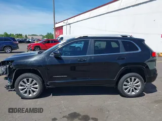 2017 Jeep Cherokee Overland z VIN 1C4PJMJS1HW530604, wystawiony jako IAAI lot #41701168 z przebiegiem 112 945 mil mil oraz . Historia ofert i sprzedaży dostępna na DreamBid. Obrazek 15.