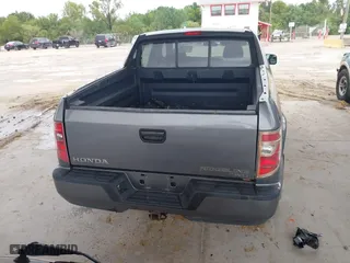 2009 Honda Ridgeline RT with VIN 2HJYK16279H501015, listed as a IAAI auction lot 41996301 with 124,716 mi miles. Bid and sale history available at carsss.com. Image 16.