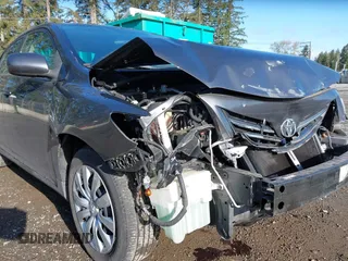 2013 Toyota Corolla L with VIN 2T1BU4EE3DC030761, listed as a IAAI auction lot 42004033 with 90,733 mi miles. Bid and sale history available at carsss.com. Image 6.