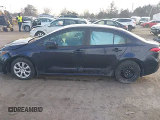 2022 Toyota Corolla LE with VIN 5YFEPMAE9NP306727, listed as a IAAI auction lot 41601452 with 29,969 mi miles and . Bid and sale history available at DreamBid. Image 14.
