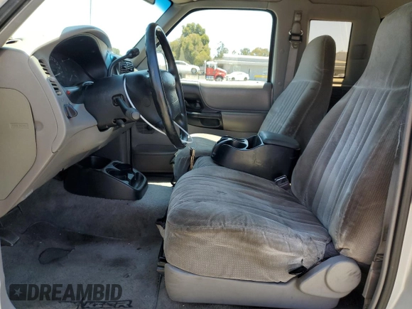 1997 Ford Ranger XLT z VIN 1FTCR14X7VPA98300, wystawiony jako Copart lot #64032695 z przebiegiem 469 086 mil mil oraz Czysty tytuł • Clean title. Historia ofert i sprzedaży dostępna na DreamBid. Obrazek 7.