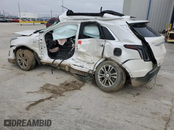 2021 Cadillac XT5 FWD Premium Luxury z VIN 1GYKNCR41MZ154357, wystawiony jako Copart lot #86819564 z przebiegiem Nie podano mil oraz Nie do naprawy • Non repairable. Historia ofert i sprzedaży dostępna na DreamBid. Obrazek 2.