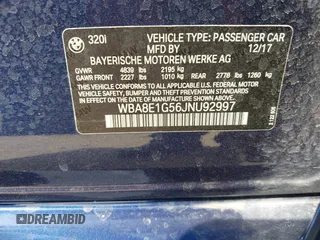 2018 BMW 3 Series 320i with VIN WBA8E1G56JNU92997, listed as a IAAI auction lot 42039869 with 105,085 mi miles. Bid and sale history available at carsss.com. Image 9.