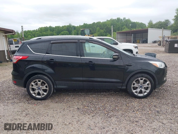 2016 Ford Escape Titanium with VIN 1FMCU9J93GUB93729, listed as a IAAI auction lot 42177294 with 158,859 mi miles and . Bid and sale history available at DreamBid. Image 13.