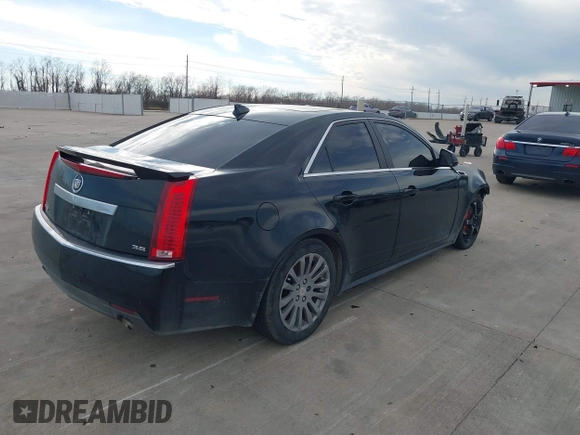 2013 Cadillac CTS Performance with VIN 1G6DJ5E37D0156897, listed as a IAAI auction lot 41359292 with 152,051 mi miles and . Bid and sale history available at DreamBid. Image 4.