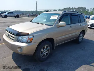 2006 Toyota Highlander with VIN JTEGP21A260095615, listed as a IAAI auction lot 41979567 with 122,904 mi miles. Bid and sale history available at carsss.com. Image 2.