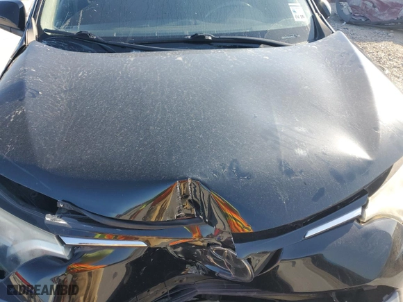 2018 Toyota RAV4 XLE with VIN 2T3WFREV2JW472232, listed as a Copart auction lot 52464025 with 131,421 mi miles and Salvage Title. Bid and sale history available at carsss.com. Image 13.