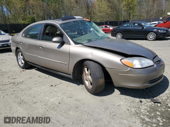 2003 Ford Taurus SEL Deluxe with VIN 1FAHP56SX3G199970, listed as a Copart auction lot 53042795 with 212,802 mi miles and Salvage Title. Bid and sale history available at DreamBid. Image 4.