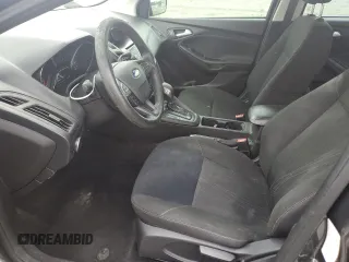 2017 Ford Focus SE с VIN 1FADP3F29HL267516, выставлен на аукционе Copart как лот 56984255 с пробегом 98 861 миль миль и Списание • Salvage title. История ставок и продаж доступна на DreamBid. Изображение 7.