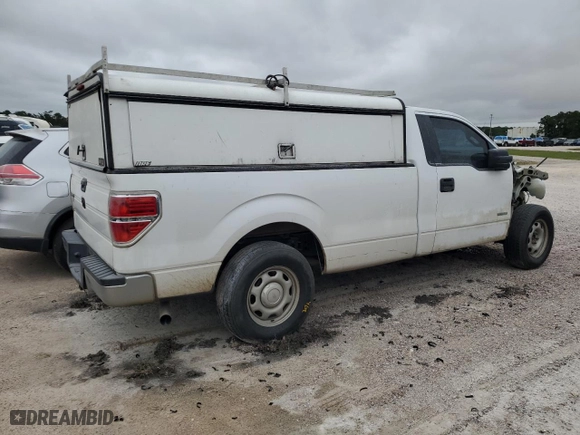 2014 Ford F-150 XL with VIN 1FTNF1CT3EKE02302, listed as a Copart auction lot 69056354 with 203,763 mi miles and Salvage Title. Bid and sale history available at carsss.com. Image 3.