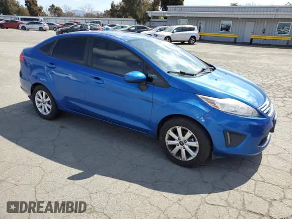 2011 Ford Fiesta SE with VIN 3FADP4BJ2BM154564, listed as a Copart auction lot 50823515 with 59,016 mi miles and Clean Title. Bid and sale history available at carsss.com. Image 4.