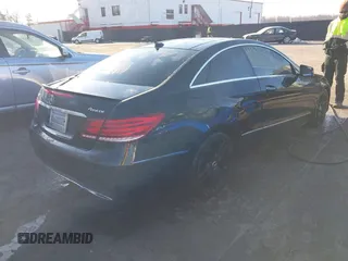 2014 Mercedes-Benz E-Class E 350 with VIN WDDKJ8JB0EF292019, listed as a IAAI auction lot 41331510 with 64,464 mi miles. Bid and sale history available at carsss.com. Image 4.