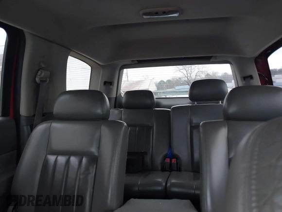 2004 Dodge Durango Limited z VIN 1D4HB58D94F111363, wystawiony jako IAAI lot #41440895 z przebiegiem 128 897 mil mil oraz . Historia ofert i sprzedaży dostępna na DreamBid. Obrazek 12.