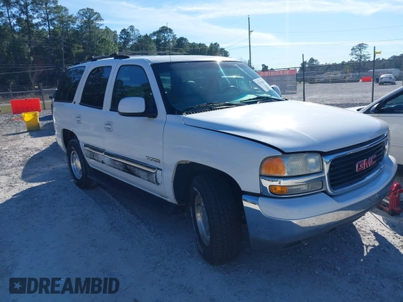 2003 GMC Yukon SLT with VIN 1GKEC13Z83R143232, listed as a IAAI auction lot 41655509 with 148,574 mi miles. Bid and sale history available at carsss.com. Image 1.