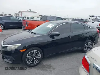 2016 Honda Civic Sedan EX-T with VIN 2HGFC1F34GH645220, listed as a IAAI auction lot 42043630 with 55,301 mi miles. Bid and sale history available at carsss.com. Image 14.