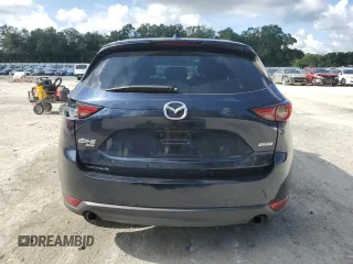 2018 Mazda CX-5 Grand Touring with VIN JM3KFBDMXJ0350499, listed as a Copart auction lot 63475745 with 119,642 mi miles and Salvage title. Bid and sale history available at DreamBid. Image 6.