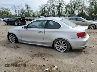 2009 BMW 1 Series 128i with VIN WBAUP73579VK74936, listed as a Copart auction lot 54558905 with 128,563 mi miles and Clean Title. Bid and sale history available at carsss.com. Image 2.
