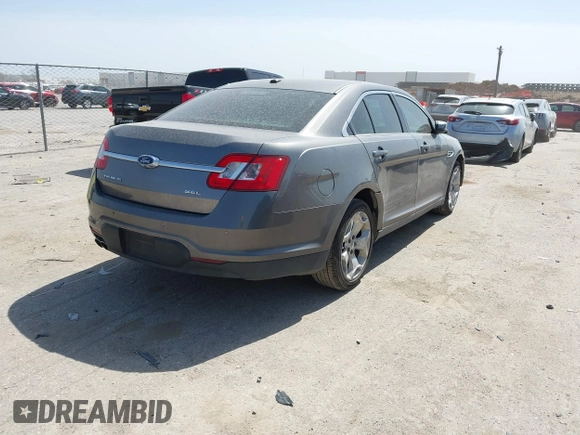 2011 Ford Taurus SEL with VIN 1FAHP2EW2BG118302, listed as a IAAI auction lot 41830053 with 188,163 mi miles. Bid and sale history available at carsss.com. Image 4.