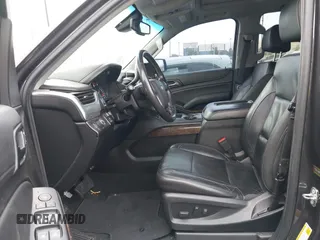 2018 Chevrolet Tahoe LT with VIN 1GNSCBKC5JR126474, listed as a IAAI auction lot 41896310 with 90,928 mi miles and . Bid and sale history available at DreamBid. Image 5.