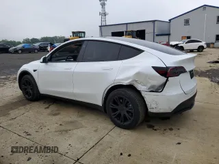 2024 Tesla Model Y Long Range with VIN 7SAYGDEE2RA329081, listed as a Copart auction lot 57254265 with 2,325 mi miles and Salvage title. Bid and sale history available at DreamBid. Image 2.