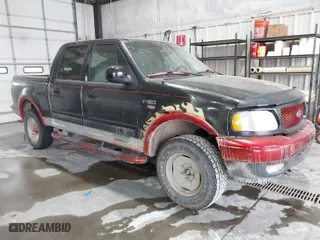 2001 Ford F-150 SuperCrew XLT with VIN 1FTRW08LX1KE21072, listed as a IAAI auction lot 41679209 with NaN miles. Bid and sale history available at carsss.com. Image 1.