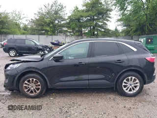 2021 Ford Escape SE with VIN 1FMCU9G67MUA23303, listed as a IAAI auction lot 42232319 with 12,694 mi miles and . Bid and sale history available at DreamBid. Image 14.