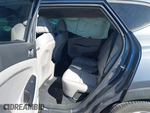 2018 Hyundai Tucson Sport with VIN KM8J33AL5JU770092, listed as a IAAI auction lot 41395349 with 101,395 mi miles. Bid and sale history available at carsss.com. Image 8.