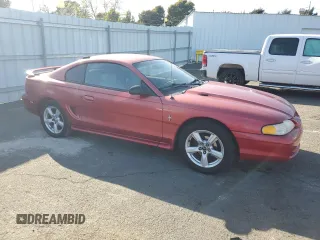 1998 Ford Mustang z VIN 1FAFP4044WF142556, wystawiony jako Copart lot #51642505 z przebiegiem 146 962 mil mil oraz Szkoda całkowita • Salvage title. Historia ofert i sprzedaży dostępna na DreamBid. Obrazek 4.
