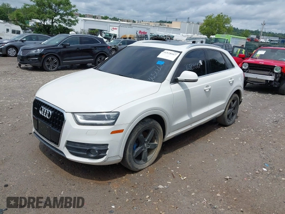 2015 Audi Q3 Premium Plus z VIN WA1EFCFS8FR001278, wystawiony jako IAAI lot #42475043 z przebiegiem 125 417 mil mil oraz . Historia ofert i sprzedaży dostępna na DreamBid. Obrazek 2.