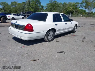 2007 Mercury Grand Marquis LS with VIN 2MEFM75VX7X623356, listed as a IAAI auction lot 41783361 with 157,921 mi miles. Bid and sale history available at carsss.com. Image 4.