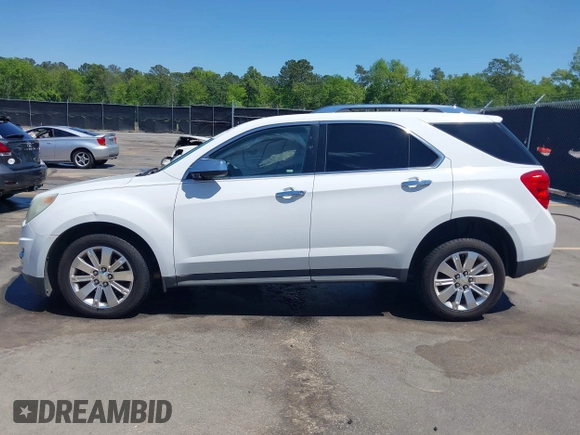 2011 Chevrolet Equinox 2LT z VIN 2CNFLPE50B6394569, wystawiony jako IAAI lot #42008653 z przebiegiem 238 617 mil mil oraz . Historia ofert i sprzedaży dostępna na DreamBid. Obrazek 14.