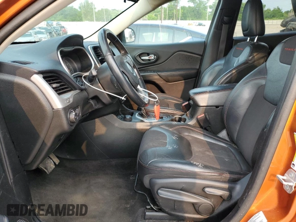 2015 Jeep Cherokee Trailhawk with VIN 1C4PJMBS0FW675807, listed as a Copart auction lot 58800615 with 109,019 mi miles and Salvage title. Bid and sale history available at DreamBid. Image 7.