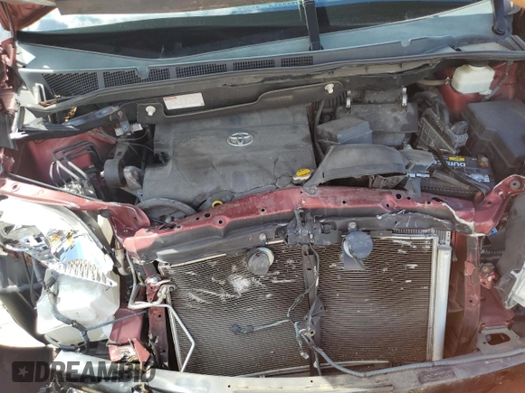 2012 Toyota Sienna XLE AAS with VIN 5TDYK3DC1CS233762, listed as a Copart auction lot 59224495 with 116,155 mi miles and Salvage title. Bid and sale history available at DreamBid. Image 12.