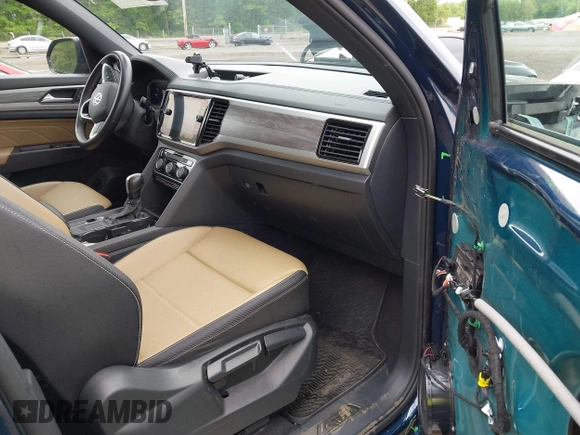 2022 Volkswagen Atlas SE с VIN 1V2JE2CA4NC205458, выставлен на аукционе IAAI как лот 42176005 с пробегом 125 429 миль миль и . История ставок и продаж доступна на DreamBid. Изображение 5.