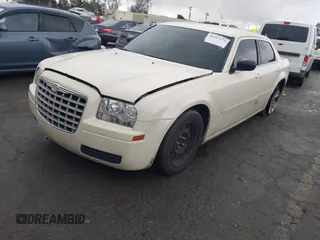 2006 Chrysler 300 with VIN 2C3KA43RX6H470150, listed as a IAAI auction lot 41767272 with 107,457 mi miles. Bid and sale history available at carsss.com. Image 2.