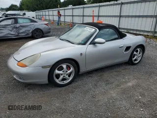 2000 Porsche Boxster with VIN WP0CA2989YU624088, listed as a Copart auction lot 64574655 with 233,678 mi miles and Salvage title. Bid and sale history available at DreamBid. Image 1.