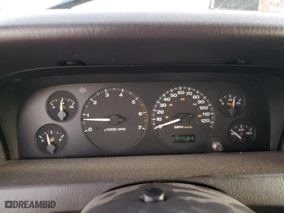 1999 Jeep Grand Cherokee Laredo with VIN 1J4GW58N6XC784679, listed as a Copart auction lot 85345304 with 234,584 mi miles and Salvage Title. Bid and sale history available at carsss.com. Image 9.