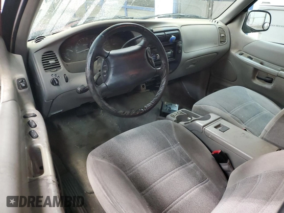 1999 Ford Explorer Sport z VIN 1FMYU24X3XUB23512, wystawiony jako Copart lot #82668734 z przebiegiem 228 701 mil mil oraz Szkoda całkowita • Salvage title. Historia ofert i sprzedaży dostępna na DreamBid. Obrazek 8.