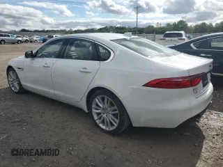 2016 Jaguar XF 35t Prestige with VIN SAJBK4BV3GCY19128, listed as a Copart auction lot 74187394 with 70,510 mi miles and Salvage Title. Bid and sale history available at carsss.com. Image 2.